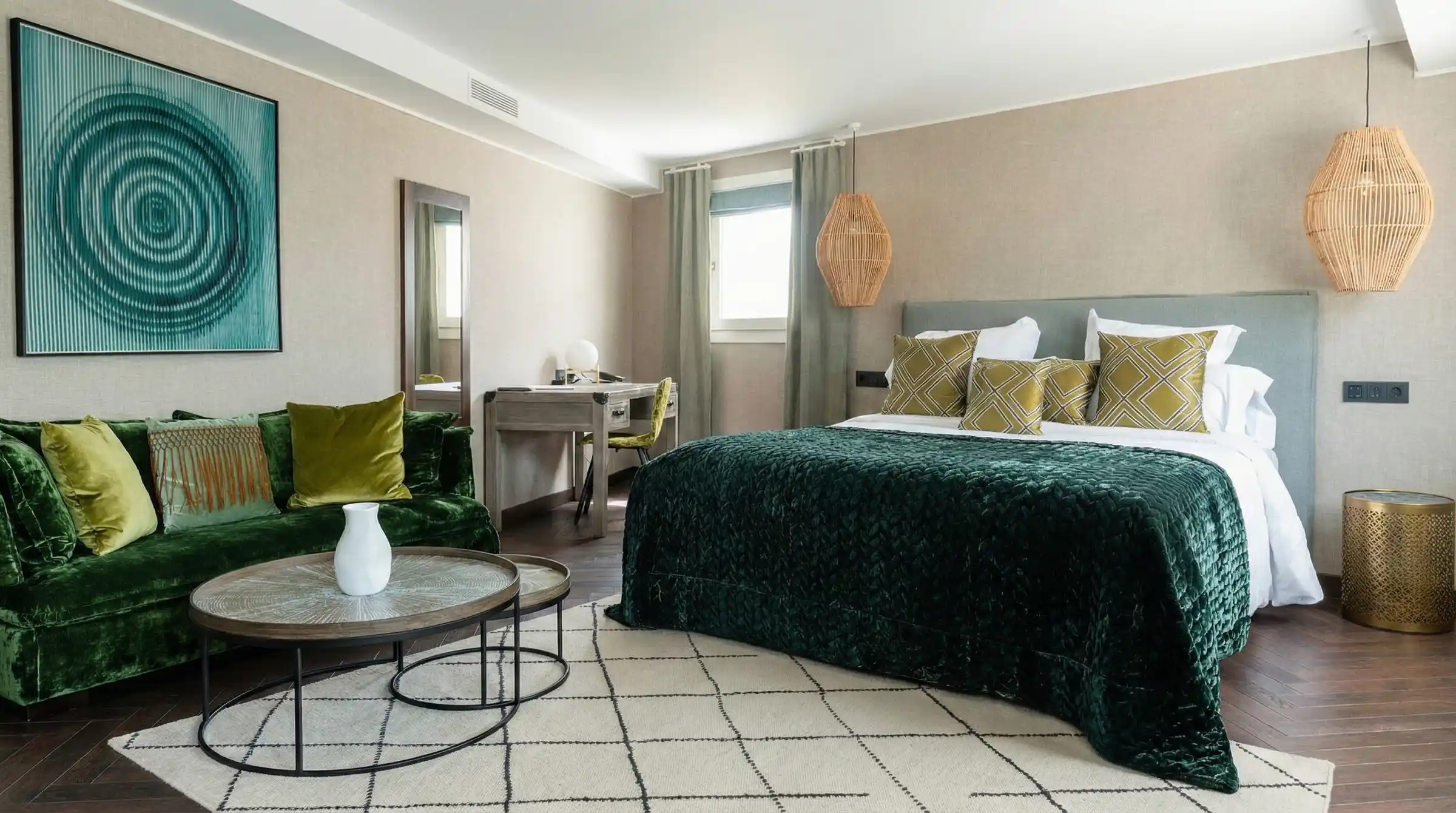 Bungalow bedroom with green bedspread and patterned tiled floor
